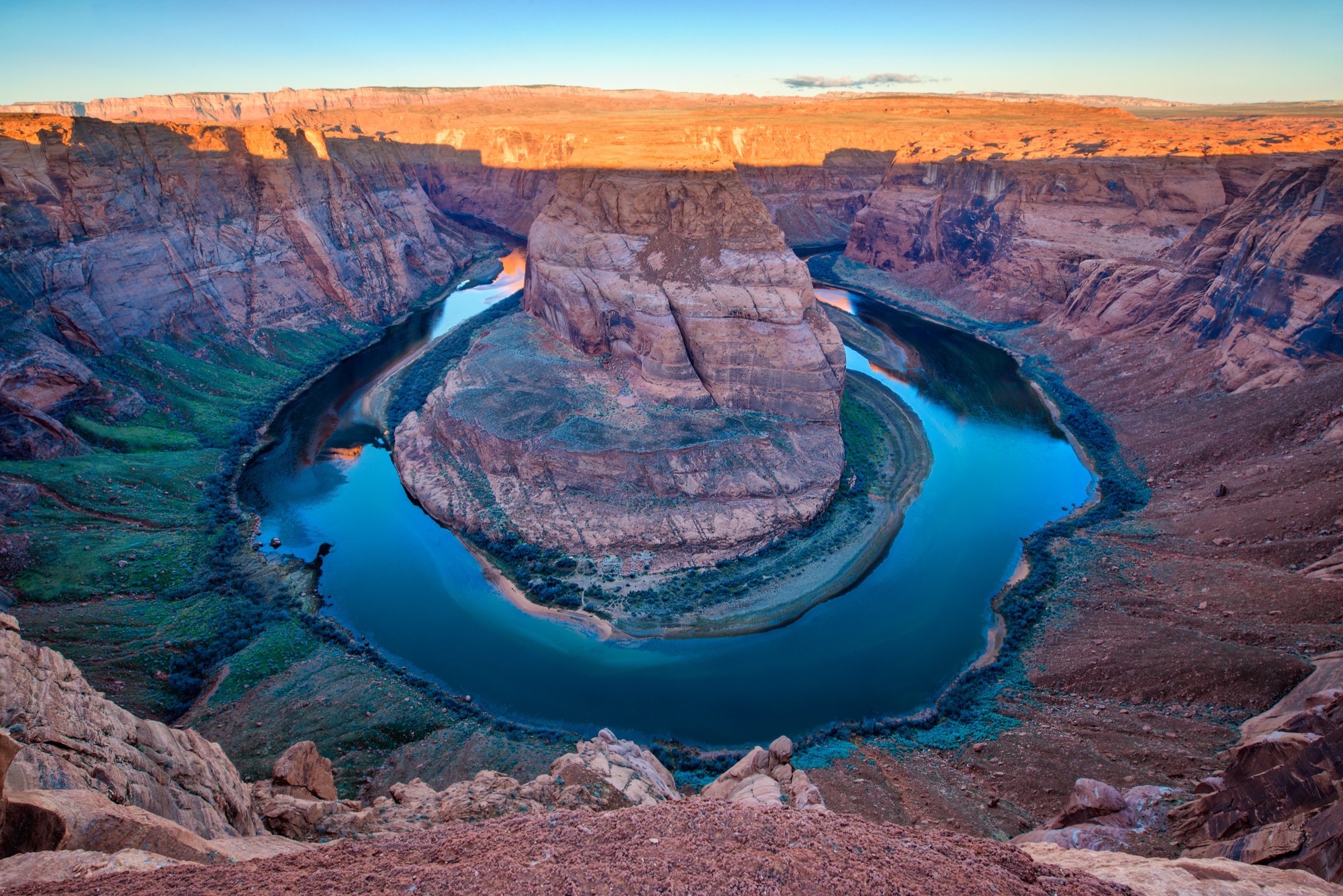 Horseshoe Bend glowing above the Colorado River